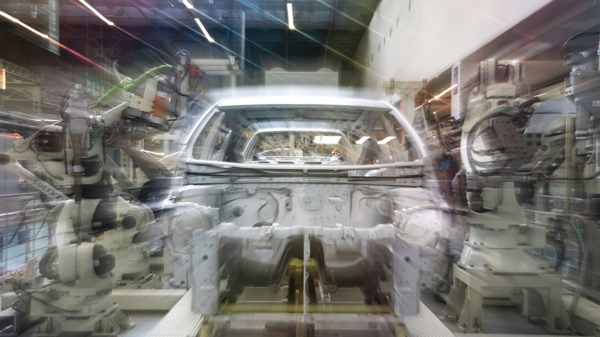 Robotic manufacturing assembly line representing complex industrial production and advanced manufacturing capabilities.
